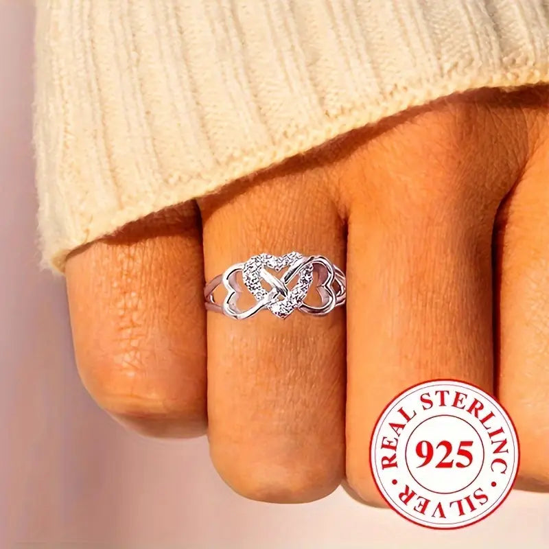 Anillo de plata de ley 925 con forma de corazón brillante y diseño infinito