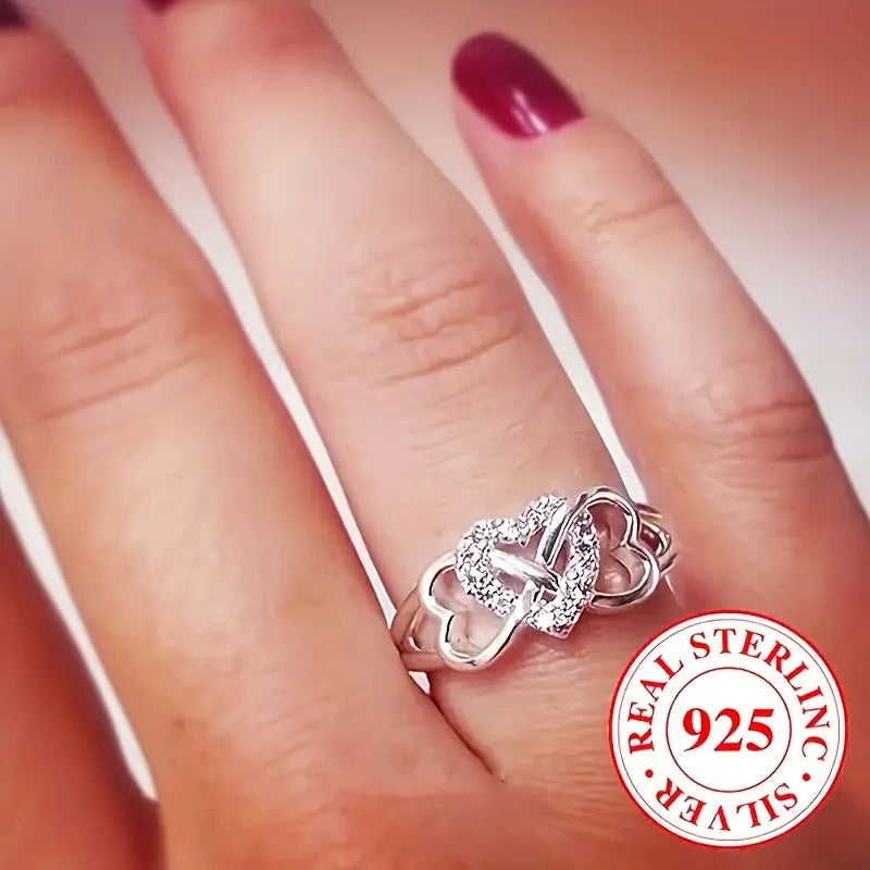 Anillo de plata de ley 925 con forma de corazón brillante y diseño infinito