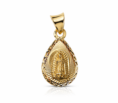 Gold pendant with intricate design on a white background