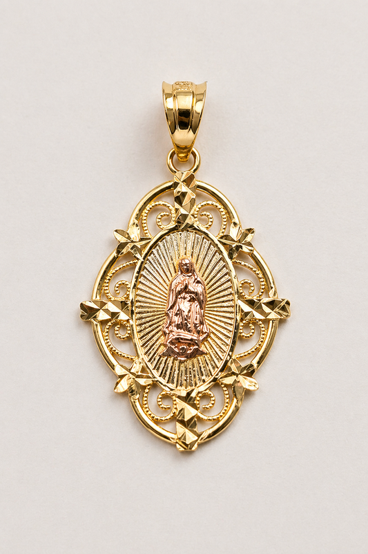 Gold pendant with religious design on a light gray background