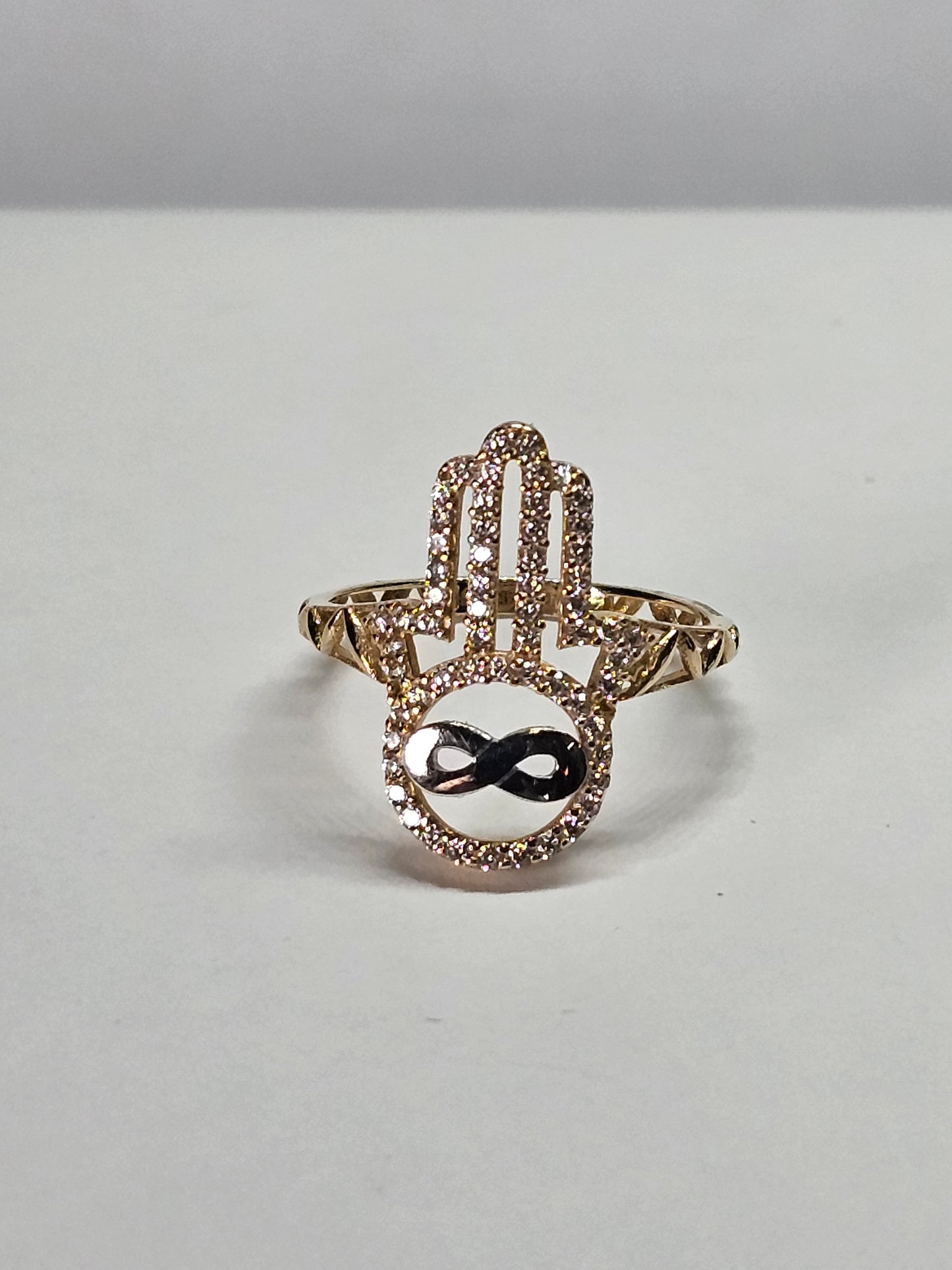Anillo manita de fatima con infinito de 14k