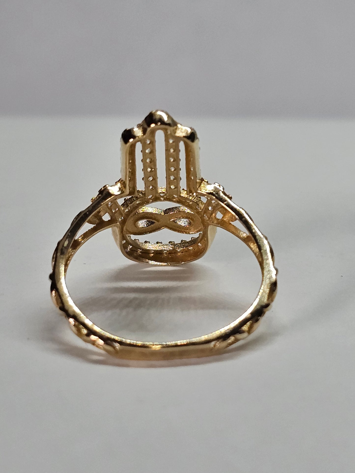 Anillo manita de fatima con infinito de 14k