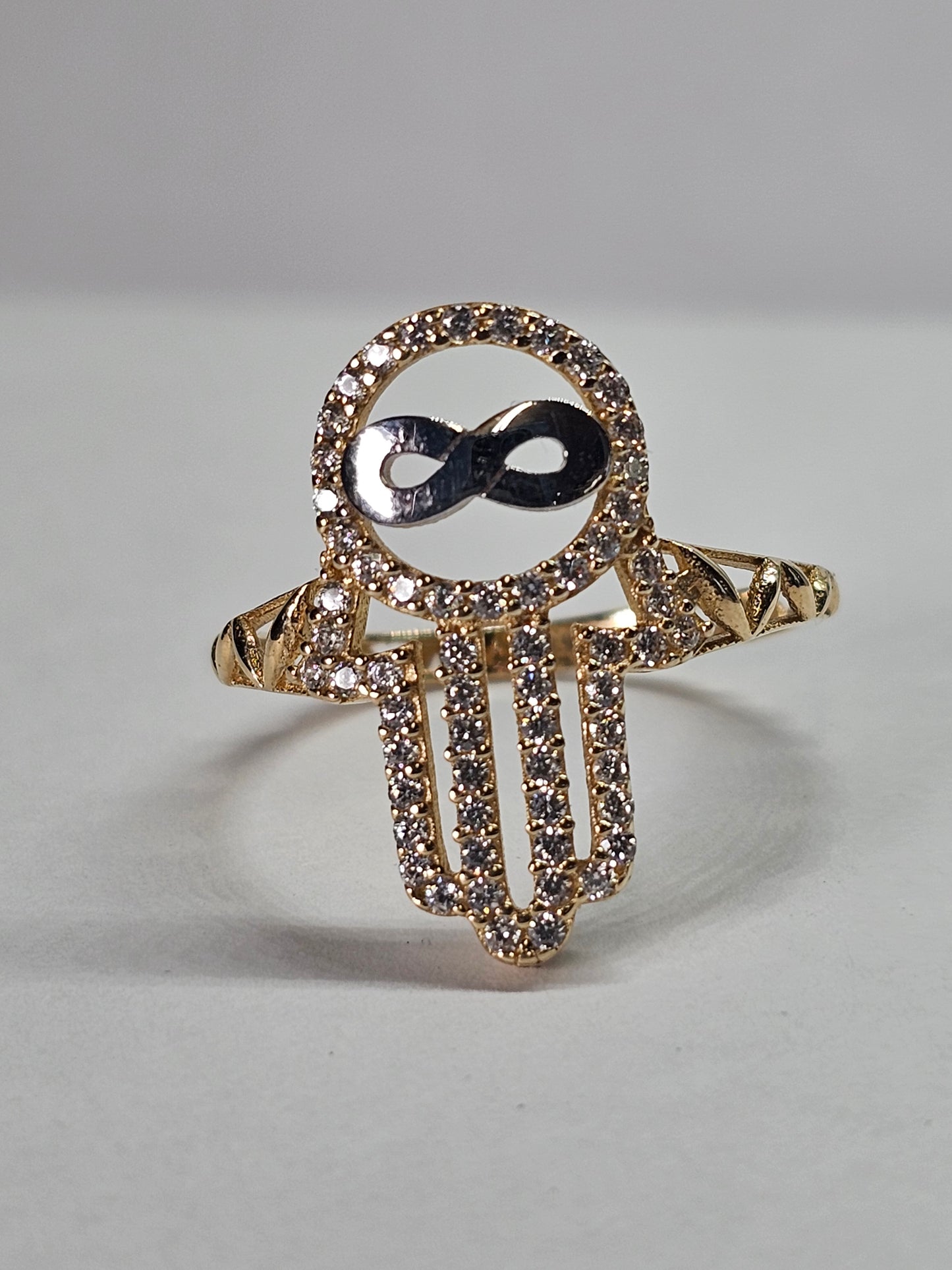Anillo manita de fatima con infinito de 14k