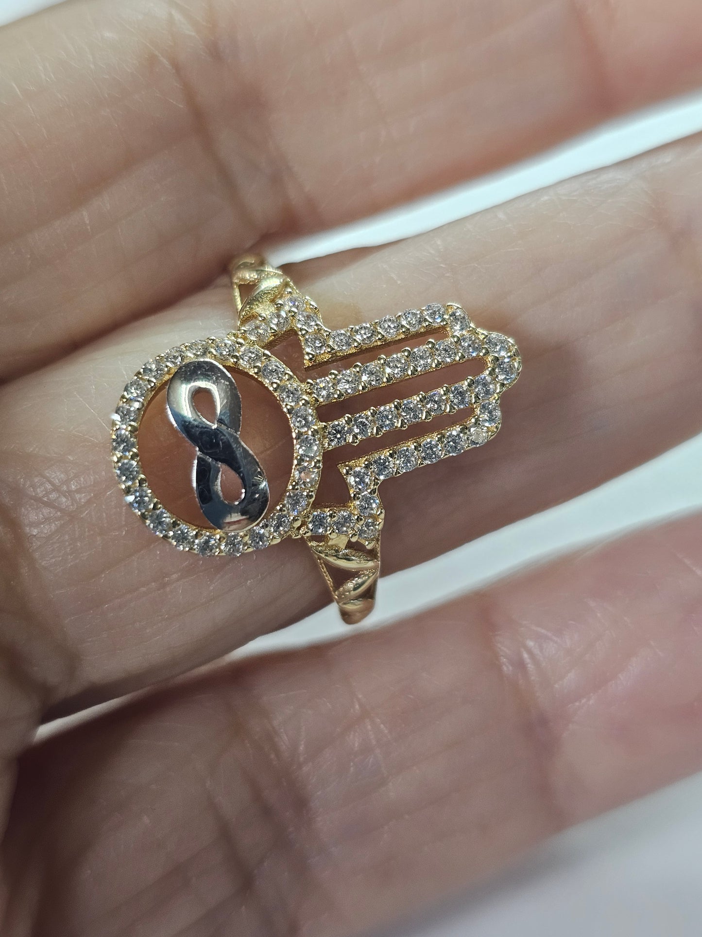 Anillo manita de fatima con infinito de 14k